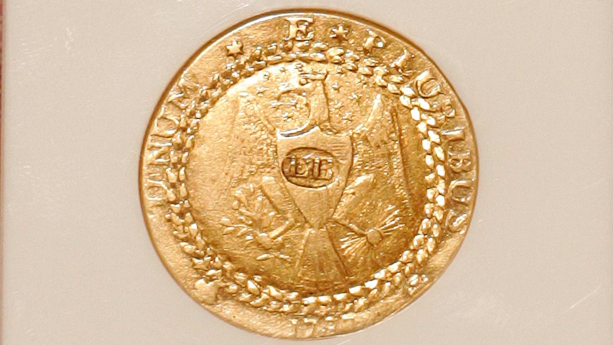 The first gold coin to be minted in America, the Brasher Doubloon.