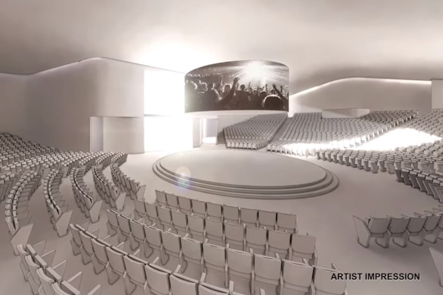 Seating surrounds a circular stage.