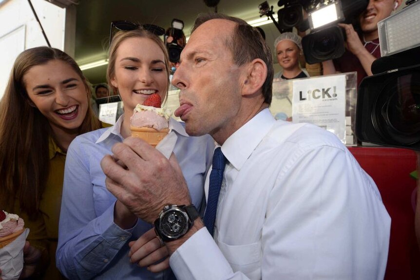 Tony Abbott licks an ice cream