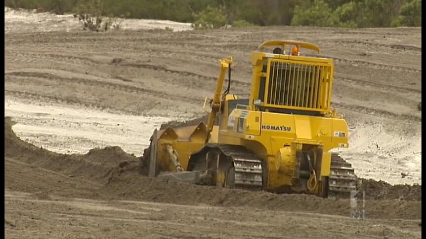 Sand mining will not end on the island until 2026.