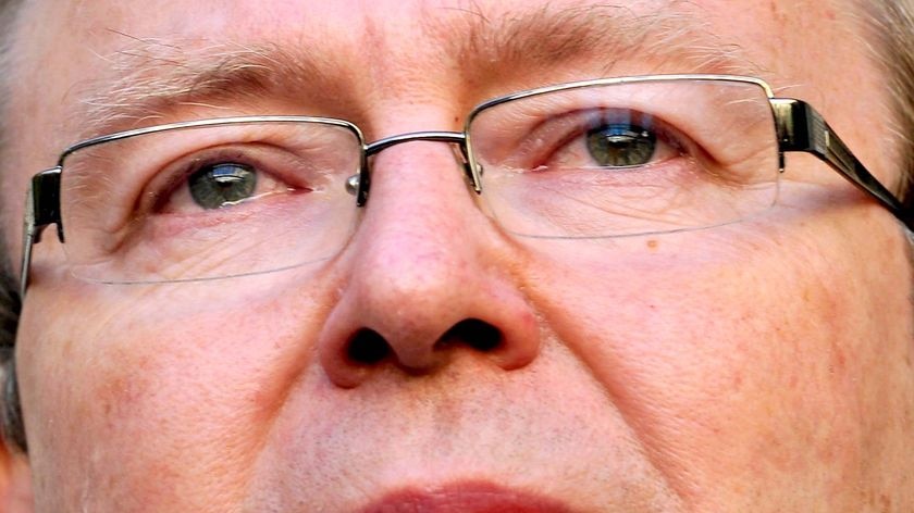 Julia Gillard says former Prime Minister Kevin Rudd (pictured) will become a senior Minister if Labor is re-elected.