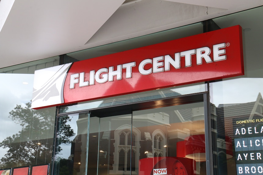 Flight Centre sign at shopfront at South Bank in Brisbane.