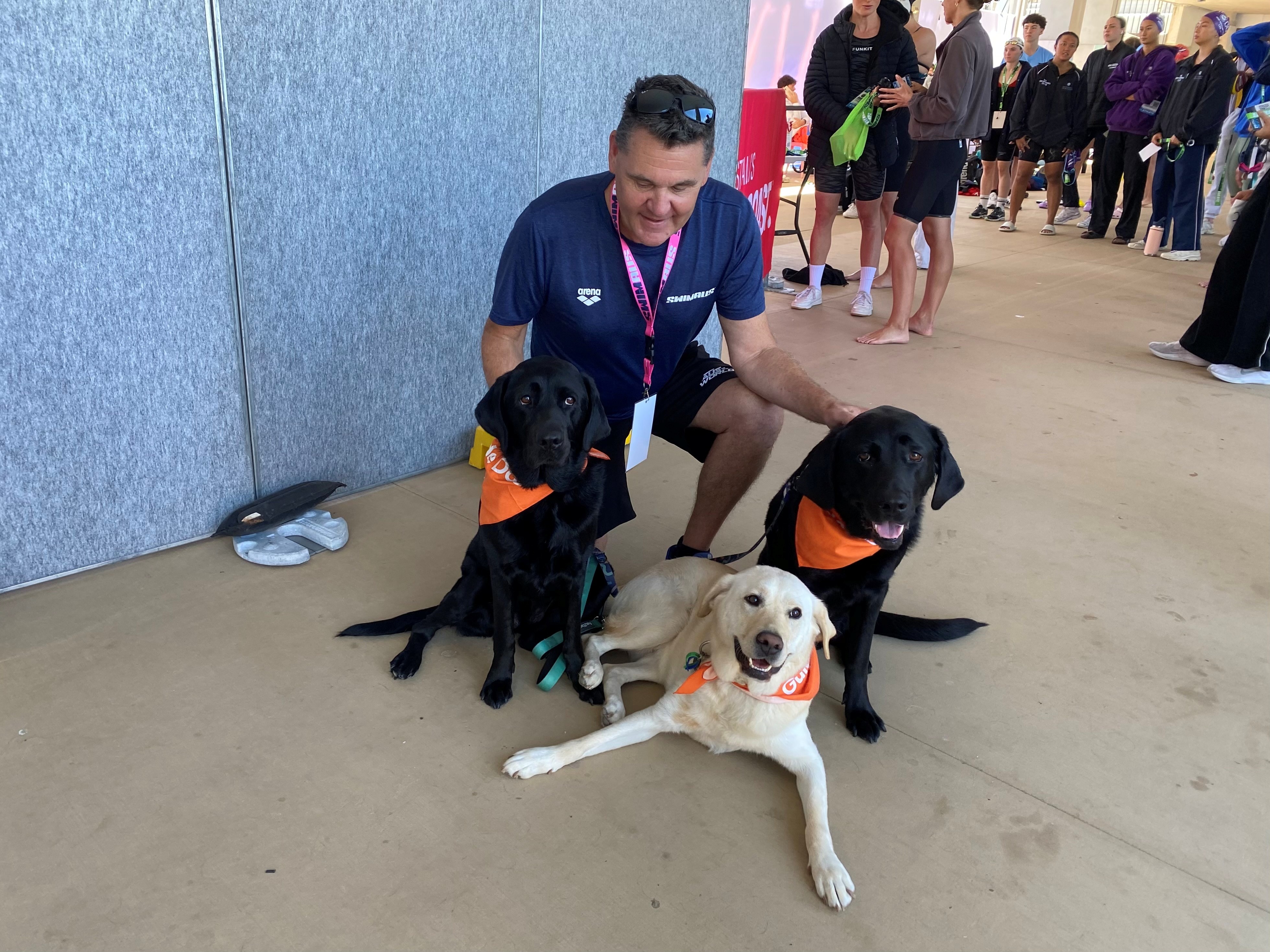 Rohan Taylor pats Clover, Elton and Evie