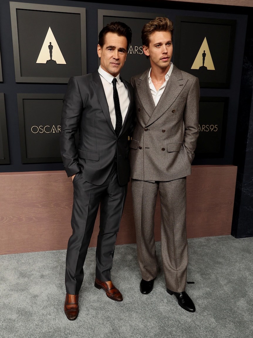 Colin Farrell and Austin Butler stand together on the red carpet. 