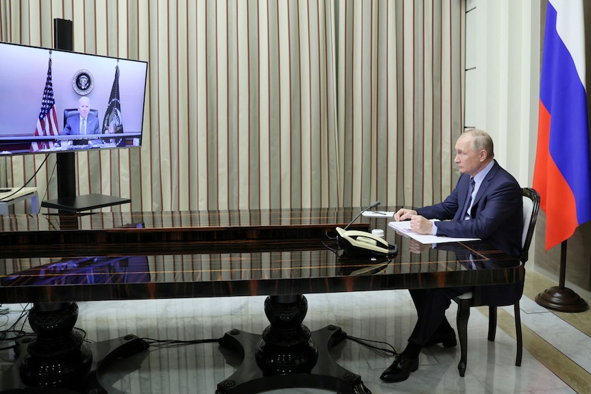 Vladimir Putin talks to Joe Biden via a video link. 