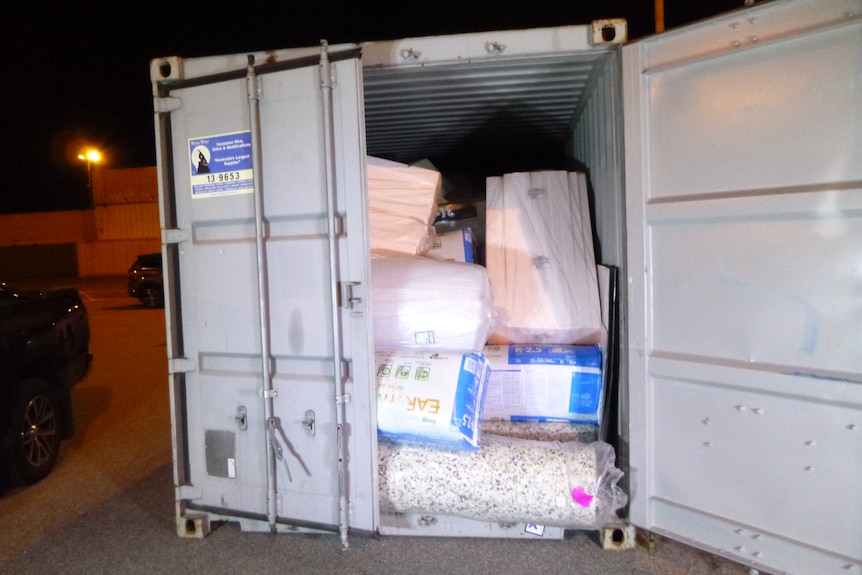 A sea container with bedding inside