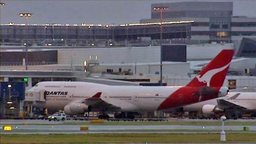 TV still of Qantas Boeing 747 after returning to Sydney