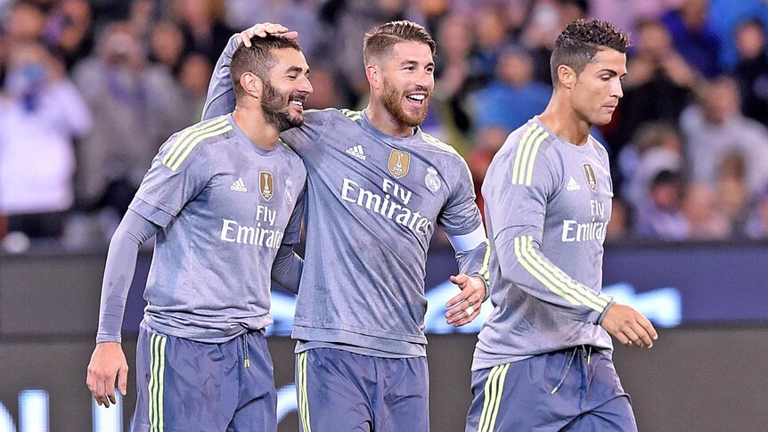Sergio Ramos of Real Madrid congratulates team-mate Karim Benzema