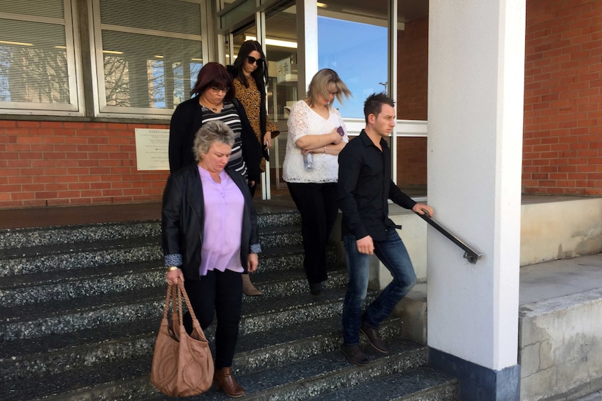 Michael Welsh's family leaving court after hearing evidence into his death.