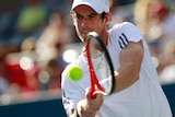 Britain's Andy Murray beat Russia's Alex Bogomolov to make it through to the US Open second round.