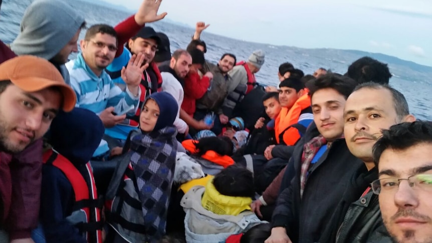 Syrian immigrants travel on a rubber boat to Greece