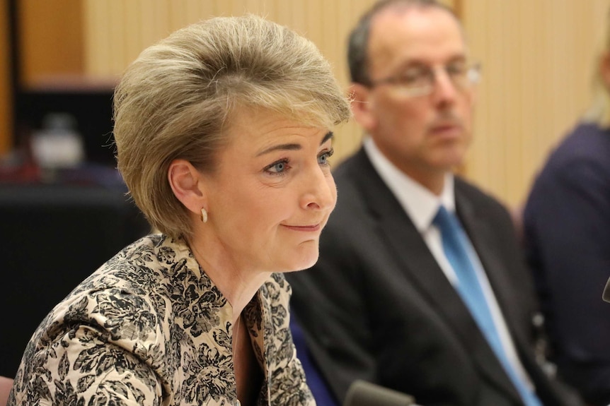 Michaelia Cash puts on a brave face during a Senate Estimates Committee meeting.