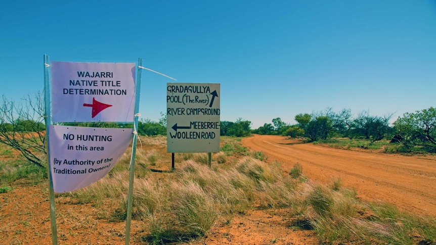Signs in the outback for a native title determination