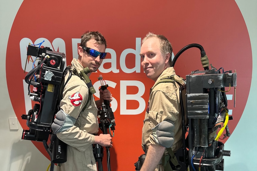 Two men dressed up as Ghostbusters