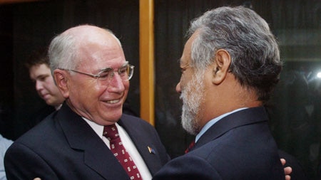 John Howard has met East Timor President Xanana Gusmao in Dili.