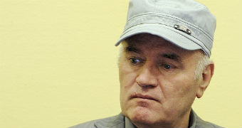 Former Bosnian Serb commander Ratko Mladic appears sits in the dock in court in The Hague
