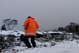 SES staffer in snowy conditions.