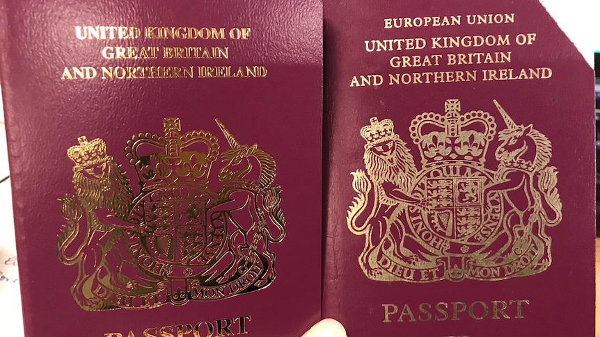 Two UK passports, one with the words "European Union" on it and one without.