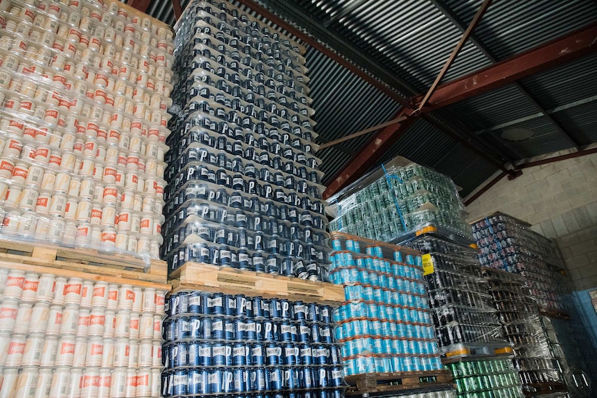 Pirate Life cans on pallets