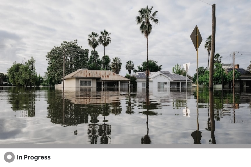 A house sits in floodwaters