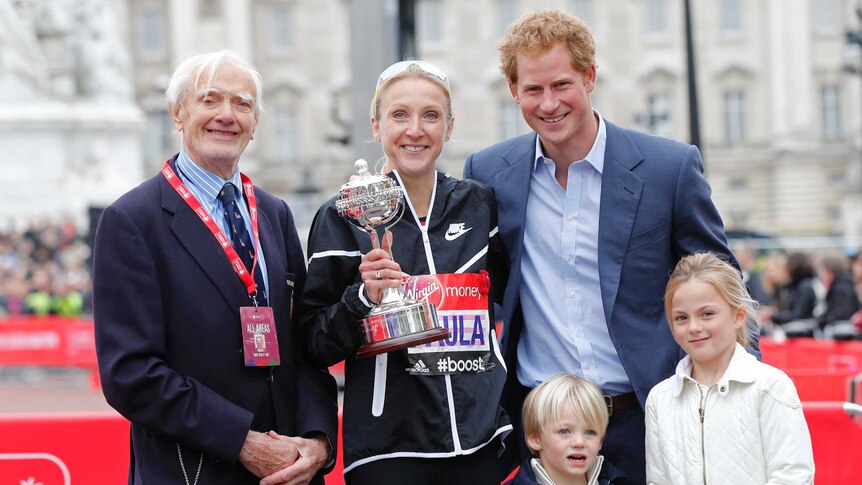 Paula Radcliffe with Prince Harry after the London Marathon
