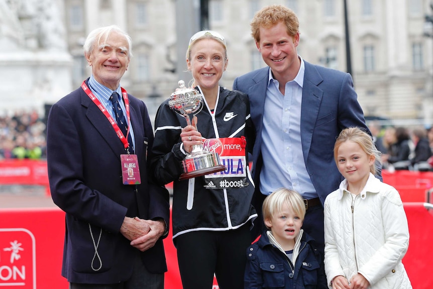 Paula Radcliffe with Prince Harry after the London Marathon