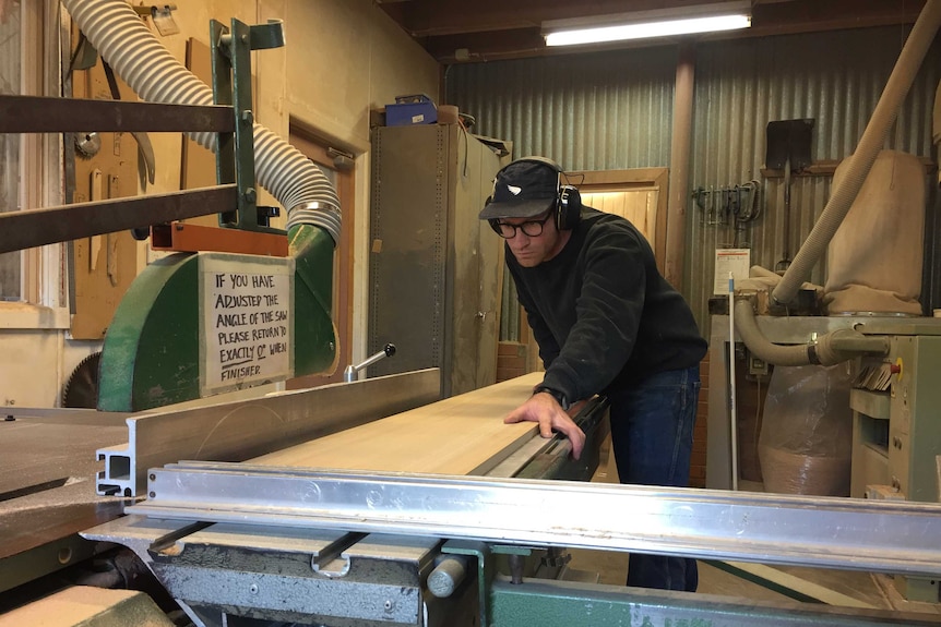 Furniture and cabinet-maker Dustin Fritsche in his workshop, he recommends starting simply with DIY.