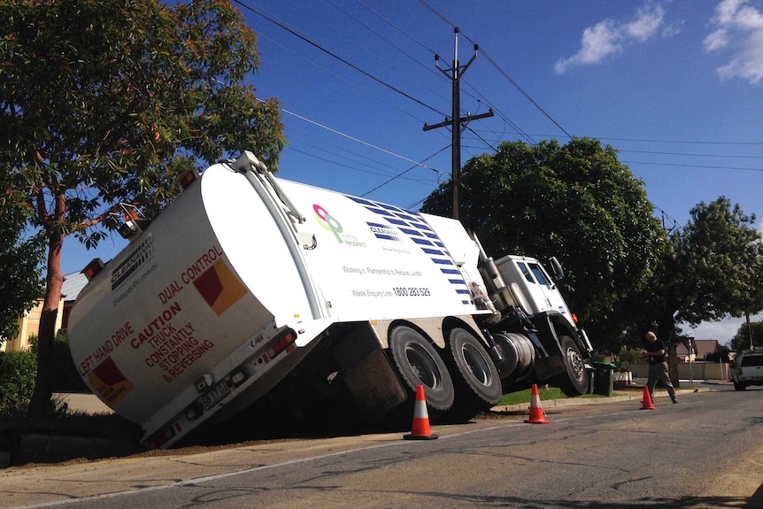 A garbage truck has fallen into a hole on Galway Avenue in Adelaide's inner north east