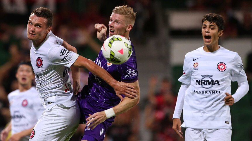 Keogh fights for possession against Wanderers