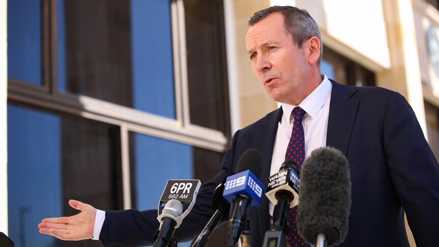 A mid-shot of WA Premier Mark McGowan speaking outside state parliament during a media conference.