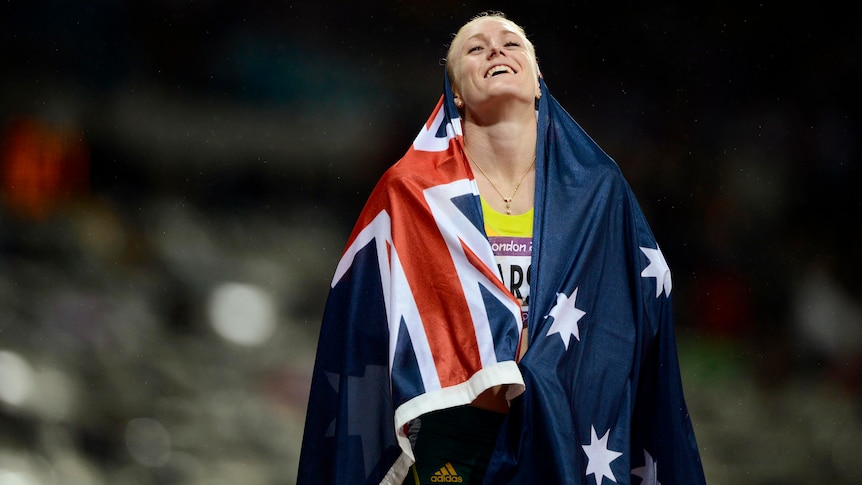 Sally Pearson celebrates after winning the 100m hurdles final at the London 2012 Olympic Games.