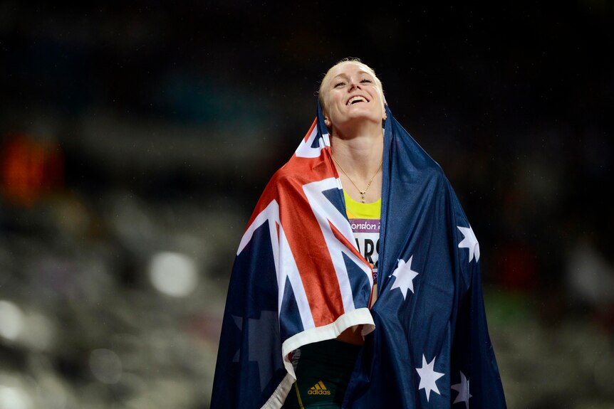 Sally Pearson celebrates after winning the 100m hurdles final at the London 2012 Olympic Games.