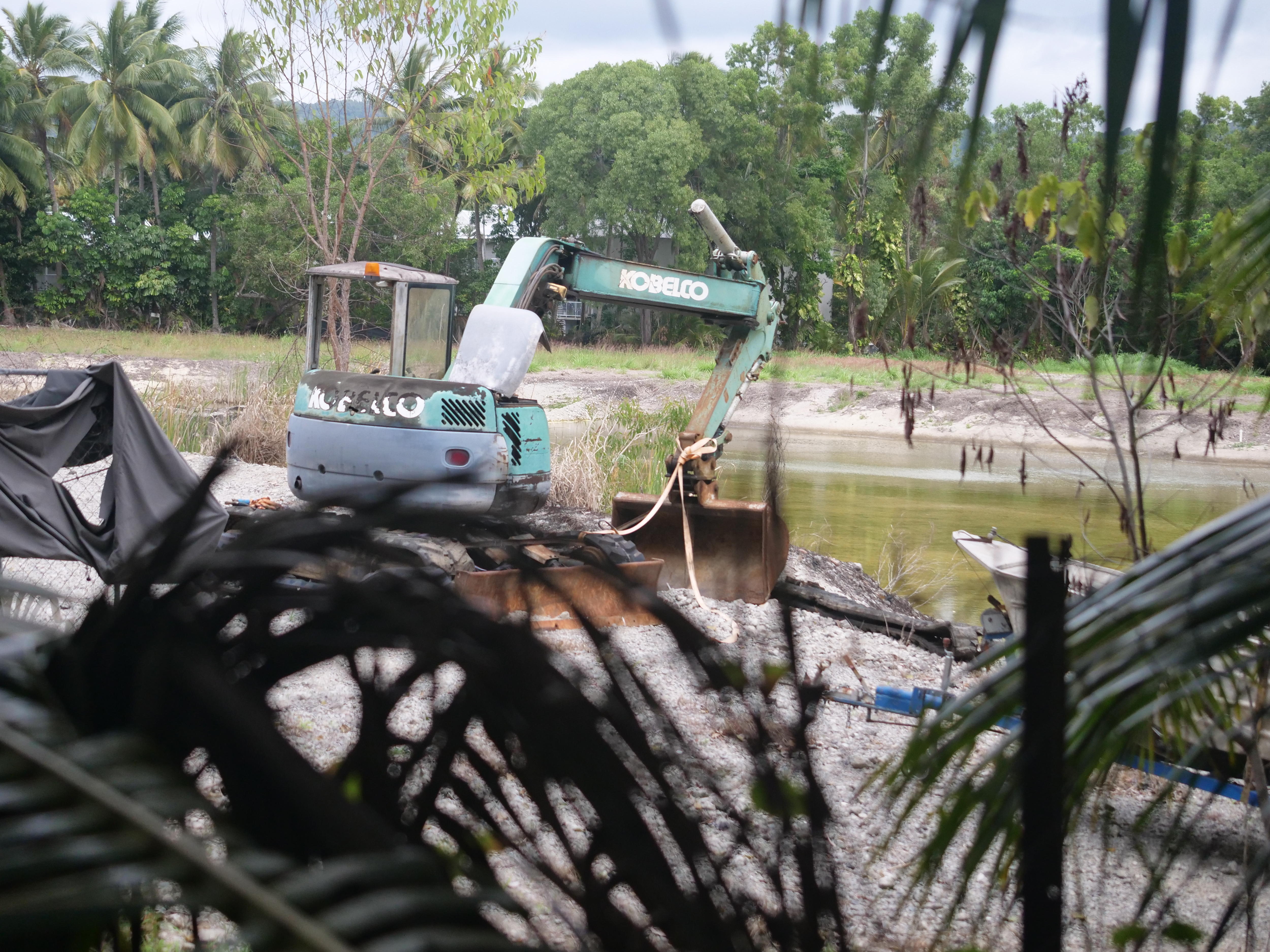 A bulldozer sits on a construction site.