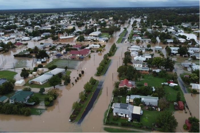 An aerial shot of a country town that has been completely inundated.
