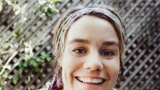 A photo of photographer Kate Stoter smiling