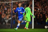 Chelsea's Eden Hazard celebrates after scoring a penalty against Spurs in March 2014.