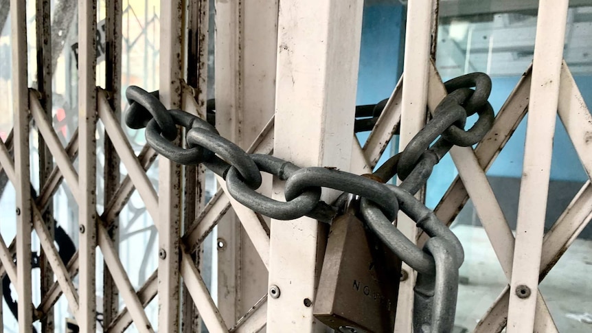 A padlock on a closed shop