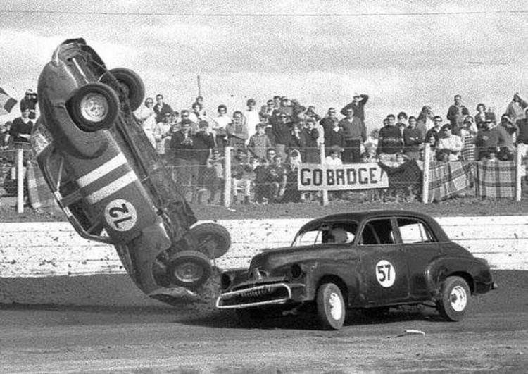 Two cars colliding during a car race.