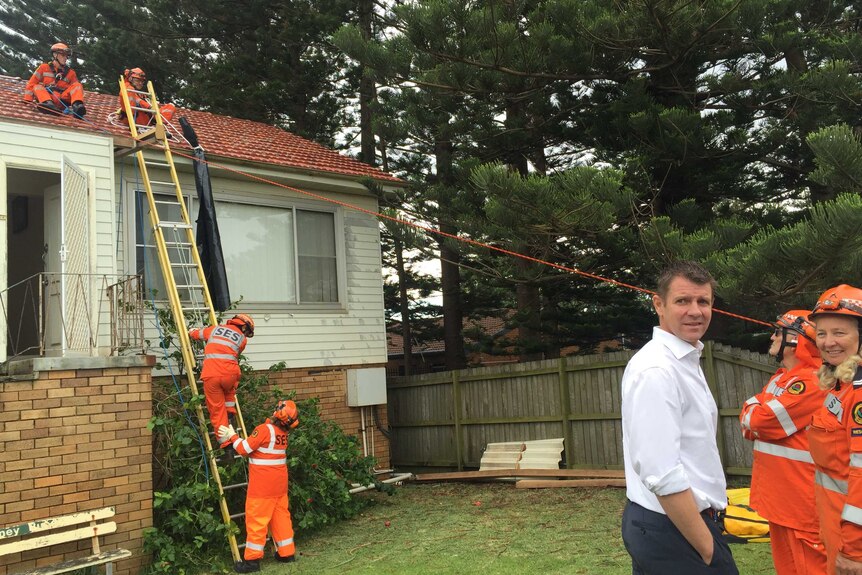NSW Premier Mike Baird is visiting flood damaged properties in Narrabeen.