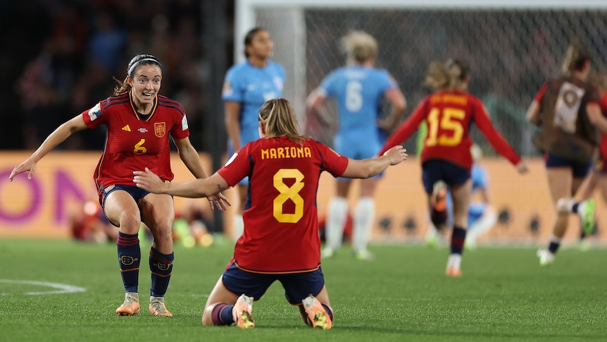 Mariona Caldentey and Aitana Bonmati celebrate Spain winning the Women's World Cup final against England.