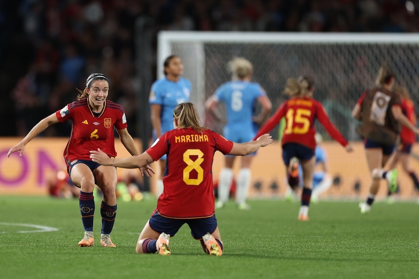 Mariona Caldentey and Aitana Bonmati celebrate Spain winning the Women's World Cup final against England.