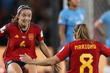 Mariona Caldentey and Aitana Bonmati celebrate Spain winning the Women's World Cup final against England.