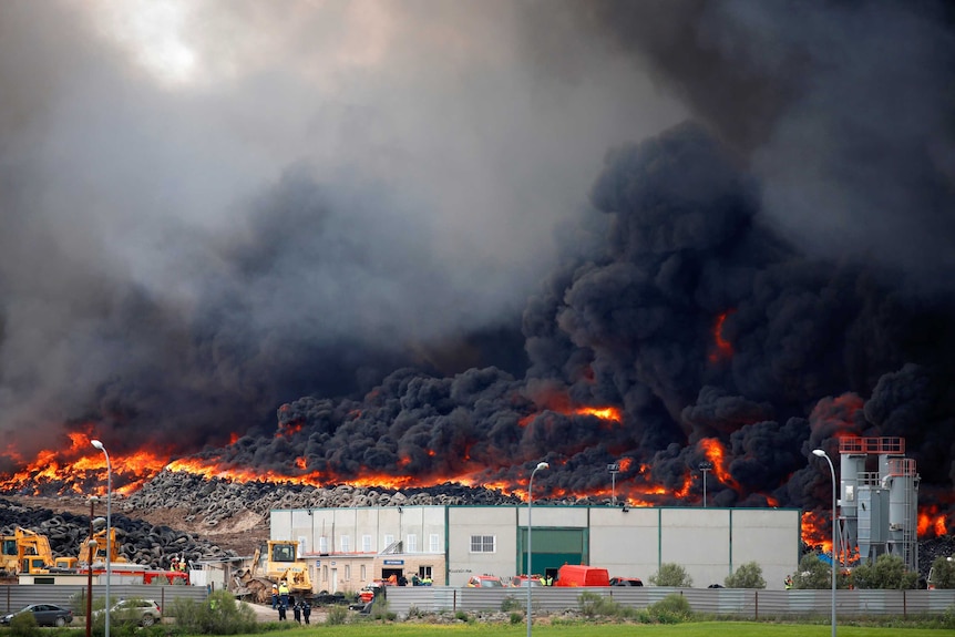 A fire rages at a tyre dump in Sesena, Spain