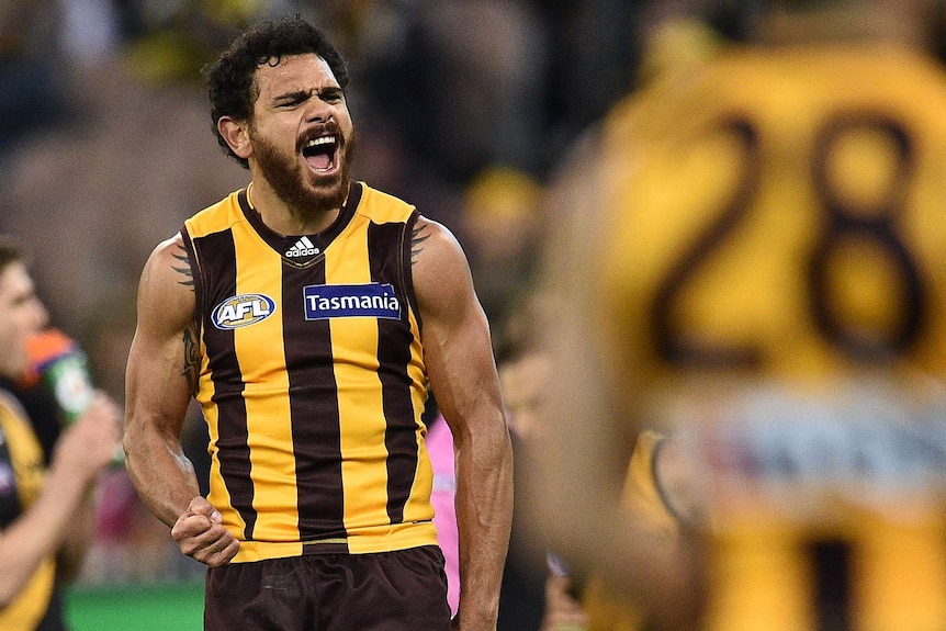 Cyril Rioli celebrates a goal for Hawthorn against Richmond