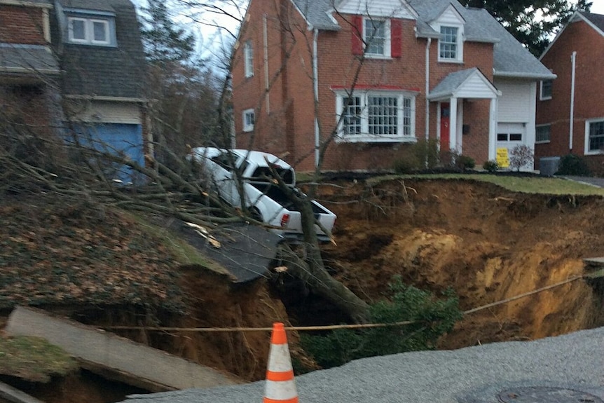A large sinkhole opens up in a Philadelphia suburb.