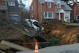 A large sinkhole opens up in a Philadelphia suburb.