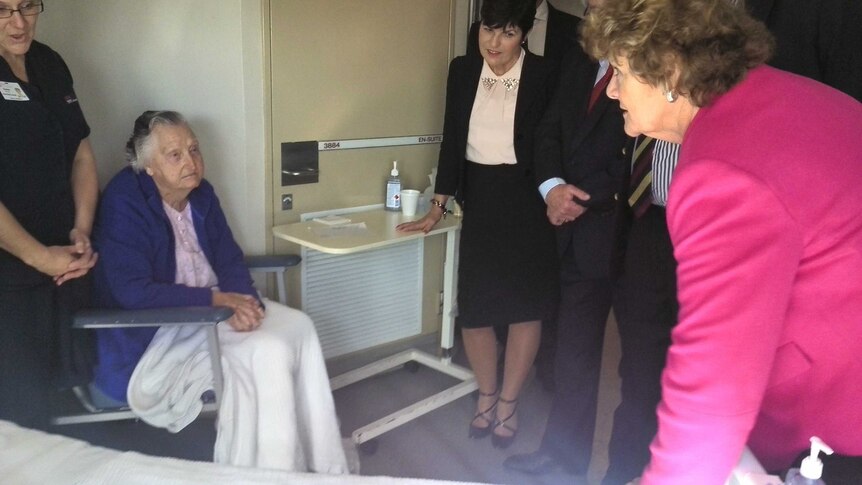 Health Minister Jillian Skinner inspecting one of the new beds at John Hunter Hospital.