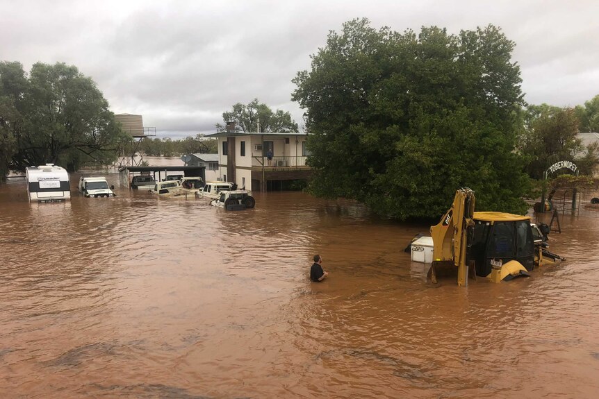 caravans cars and house inundated with water