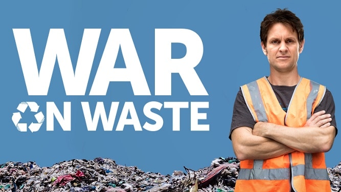 Craig Reucassel stands in front of pile of rubbish, text reads War on Waste