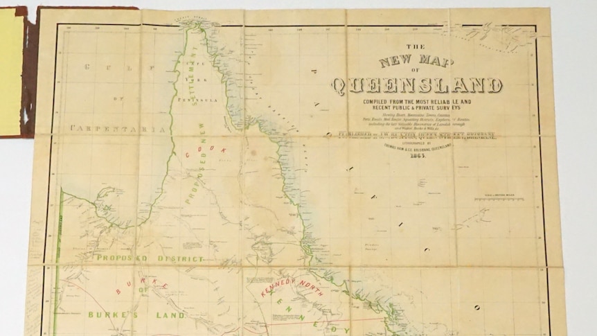 an yellow stained map of the state of queensland 
